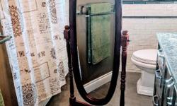 Lovely Chevelle Tilting Floor Mirror in EXCELLENT CONDITION! Beautiful Rich cherry wood finish. Pretty turned spindles. Tilts for that perfect view! Perfect for your bedroom, bathroom, walk-in closet or entry way. Cross posted.