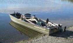 Lowe 1232 Jon boat (2008) Fully rigged with Minnkota electric motor: 2 deep cycle batteries; charger; Scotty anchor system; anchors and ropes; raised seat; flooring; Yakima truck rack. $1100 obo.