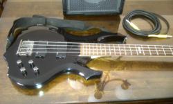 I am selling this LTD bass guitar with Peavey Max 158 amp.  I purchased the guitar from a friend, thinking I could learn how to play.  I didn't have the time to invest in it.  It has two chiped corners, but still looks and plays great.  Amp is new with