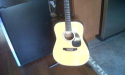Mann acoustic electric rare guitar with the pickup built into the 22nd fret.This guitar is in excellent shape sounds great plugged in or not.,comes with gig bag