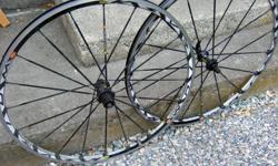 Mavic Ksyrium SL wheelset. The rear rim has a crack in it (see photo). The font is fine and the rear hub and spokes are fine. These have just been collecting dust since I replaced them. Campagnolo splined freehub for 10 speed.