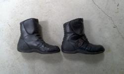 Size 10 motorcycle boots. They retail for 189.95 online, before taxes. They have a few rips, but if repaired would serve as excellent boots.