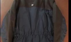 Men's size XL dark blue & black Timberland jacket in like new condition. Plenty of pockets, detachable, cinchable hood, waist cinching cord, very warm. Purchased new for over $300. $60 firm.