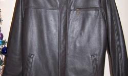 MENS LARGE SIZE DANIER LEATHER COAT. IN EXCELLENT CONDITION. WORN ONLY ONCE.