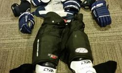 This is a full set of hockey gear that I got a few years back. It makes it hurt a lot less when you fall on the ice (which I did a LOT), and when you get hit by a puck. I played a few seasons of beer league hockey and now I'm picking up different sports.
