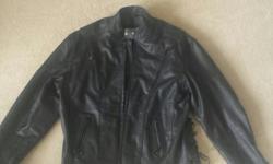 Excellent condition. Soft and heavy cowhide leather, zip-out lining, two front zipper vents, two zipper vents on back, 1.2 to 1.3 mm thickness, laces on sides, with zippered sleeves, long back. See my other ads for more motorcycle items. Size is XL