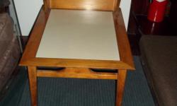 Solid walnut , mid century step table with An white insert , sturdy and in very good condition. Size: 20" by 26" by 15" high and 23" high top level.