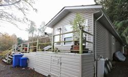 # Bath
1
Sq Ft
963
MLS
401833
# Bed
2
Enjoy the peace and tranquility this ocean view home has to offer. Situated on 1/2 an acre of forested property with its own creek. Minutes to the Mill Bay Centre, close to all amenities, this renovated modular home