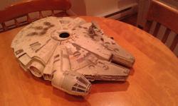 Plastic Millennium Falcon model. Good condition. Designed to be attached to the ceiling. Large but not heavy. About 21" x 17".