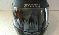 Shark RSF2i helmet. Like new. Purchased new and worn twice. Still has new helmet smell. Never dropped. Size small. Has carrying bag and warranty card (not filled out).