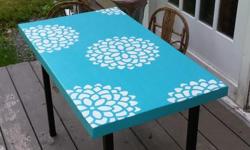 Nice solid wood slab and steel legged table done in Country Chic's Reloving Delightfully Blue with white Mum flower stencil. Give your summer deck or patio a splash of colour. Or use as a coffee table your choice. Top coated but not weatherproof. Measures