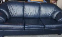 A beautiful navy blue leather couch for $150. The couch is only a few years old with some minor wear to it, otherwise it's a really nice couch and very soft and comfortable.