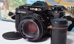 NEAR MINT ~ Minolta X-700 35mm Film Camera with MD 50mm f2 Lens
***Great Camera for Photography Students***
Comes with Minolta Neck Strap
Lens Cap
Vintage Film Roll Holder
Brand New Batteries
* Please study all photos carefully as they form part of the