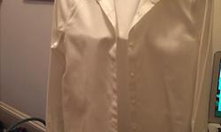 I've never worn this lovely petite white Jones New York blouse. Selling for $20. I bought it at The Bay for over $70 a few years ago but it's just been sitting in a suit bag in my closet. There are no problems with the blouse, but I just find I never wear