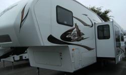 NEW 2011 COUGAR 276 5TH WHEEL.
1 LARGE SLIDE AND AIR CONDITIONING.
OTHER OPTIONS INCLUDE:
AIR MATTRESS HIDE A BED, TWIN LOUNGE CHAIRS, TRAIL AIR SUSPENSION, THERMAL PANE WINDOWS, ELECTRIC AWNING, OUTSIDE SPEAKERS, DAY NIGHT SHADES, MICROWAVE OVEN.