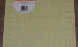 I thought I was buying one from the online store and bought 3...
The Fiskars mats are great for cutting material or paper on - I use mine for quilting, scrapbooking and card making.  (Very similar to Olfa Mats.)
They are a high quality, self healing mat
