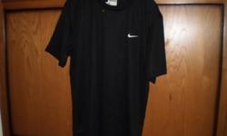 Men's Black Nike T-Shirt,  with white Swoosh  - Never worn
New with tags - Smoke Free Home
Size Men's Large 100 % Polyester
6.00 OBO