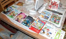 We are selling a fairly new, barely used Nintendo Wii. Package includes the following:
- Wii Console (all cables and sensor)
- 2 remotes with rubber cases
- 2 nun chucks
- 1 sensor case
- 1 wheel
- 1 Zapper
- Fit Board (including game)
- 12 Games
