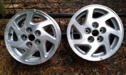 Excellent condition. One pair of 15 x 6.6" - 5 bolt Nissan alloy wheels. From Nissan Maxima I was told. No texts please. Located in Cobble Hill.