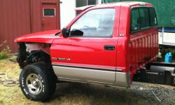 1994-2001 DODGE RAM 1500 4X4 SLE Complete Cab and Interior with Hood. No rust, no dents, good glass, no rips in upholstery. Has center seat and overhead consoles plus cab visor with lights. I have an overhead I-beam so you can easily unbolt it from frame