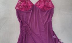 new with tag Stretch lace and mesh babydoll and gstring
Color burgundy
Size S/M