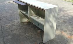 Office desk credenza/hutch. Excellent condition, fluorescent light, two doors.
Two units available.