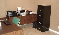 Office desk, credenza, bookshelf, rolling chair and two, 2 drawer file cabinets.  come pick them up
