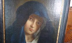 Antique MADONNA IN SORROW Oil Painting features a beautifully done copy of Giovanni Battista Salvi da Sassoferrato's original work.
Signed and dated CARLO SOLEL?( either L or T ) 1909 in ink on the bottom left of the Wood Framed back. There are other