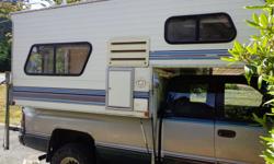 1995 Okanagan truck camper, clean and in great condition. New matress.new main hatch, three way fridge with freezer, stove with oven,furnace.Has bathroom with closet and storage, camper has had very little use.$3,850.00 O.B.O. trades may be considered.