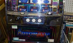 GREAT OLD SLOT MACHINE WORKS A1. A MUST FOR THE MAN CAVE. CAN DELIVER