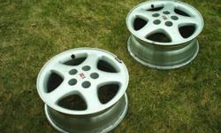 I have two 16" wheels for an Olds Cutluss Supreme SL.  these came off an 1997 car, but fit  1993, 1994, 1995, 1996, 1997.  These are in great shape and there is no rubber on them.