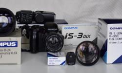 This camera is in very good condition. It has many features a modern digital camera has. Auto-focus,35-180mm zoom ED lens. It has spot metering,macro mode, scene modes,flash type manual focus and exposure compensation. Comes with a remote shutter release,