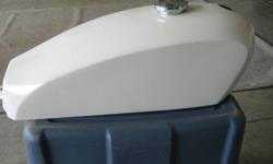 For Sale,
 
One Omars fibreglass gas tank, fits Yamaha XS 650. Never painted, still original white gel coat, as new. Cost $350.00 originally. Sell for $200.00 plus shipping.