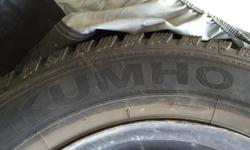 Four Kumho studded winter tires, 195/65 R 15, on black steel rims (5/114.3). Used for two winters, less than 15,000 km in total.