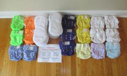 We are selling 18 diapers and 37 inserts:
4 White 2 Yellow 1 Light Blue 19 Smaller Inserts
3 Purple 2 Green 1 Light Mauve 18 Larger inserts
2 Orange 2 Mauve 1 Light Yellow
Each diaper has a series of twelve snaps, lets you adjust the diaper to four