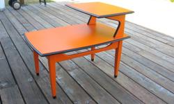 Wood vintage step end table
Refurbished and sprayed orange with black accents
Top coated with satin clear
Dimensions:
Length - 29 inches
Width - 20 inches
Height - 23 inches
keywords - restored, painted, retro, unique, one of kind, display, 70's