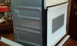 kitchen aid stove insert, door spring needs fixing, needs some cleaning. works