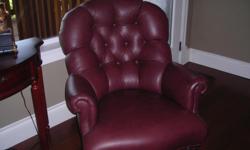 scratch resist Ethan Allen leather chairs. very comfy club chairs in deep red color. front legs have wheels. new cost $3000 for the pair.