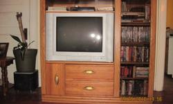 Beautiful Palliser Oak Entertainment unit for sale - Features Solid oak and veneer construction throughout, and holds a 27" TV perfectly.
57" Wide
23" Deep
52" High
Hole for TV is
34-3/8" Wide
23-1/4" Tall
21-1/4" Deep
Note Shelf above TV is removable for