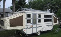 REDUCED!! NEW PICS- SAME DEAL!
THIS POP UP TRAILER IS EQUIPPED WITH ALL THE
ESSENTIALS- INCLUDES SCREENED DINING AREA OR CANOPY. HARD SIDES HAVE SLIDING GLASS WNDOWS WITH SCREENS AND SIDES  "BOOK" CLOSED WHEN LOWERED, AND MINIMAL CANVAS TO DEAL WITH.
THE