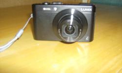 Excellent camera, lots of features, barely used. Includes software and case. Purchase price $350