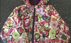 This jacket was probably the favorite item we've ever bought for our daughter. We bought it when she was still too small for it, and wore it until it looked silly because it was too small. Yet it is still in amazing condition.
Integrated hood and down