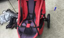 Red Phil and teds stroller. In good condition, kept in garage, pet and smoke free home. Includes extras a pictured.