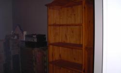 beautiful solid pine bookcase with arched top and 2 drawers at bottom. measures 38 w x 75 h x 14.5 deep.