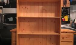 Pine bookcase, in great shape. Measures 36.5"wide, 11"deep, 71"tall. Take a look at my other ads to view more pine furniture in the same finish for sale. Sorry, no delivery available.