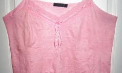 Versatile pink camisole with a special crushed effect look. Size 14, worn once. Pick up in downtown Ottawa (Bank/Queen/Kent/Albert area) or in Rockland.