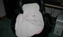 Pink car seat bunting bag.  Used last winter only.  Clean and from a smoke free home.  Gets rid of the need for a snow suit for travelling!