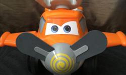Dusty from the planes movie. My son has loved this toy but he is getting a little too old for it now and has too many ride on toys. In excellent condition. Makes sounds and propeller spins. Everything works!