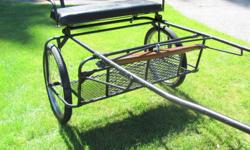 Steel 2 wheel pony cart. 20 inch tires. Shaft length 60 inches, width at single tree 30 inches, width at front of shafts 24 inches.
Good condition, barn kept.
Pony harness is nylon c/w bit also in good condition.
Cart is suitable for pony or donkey but