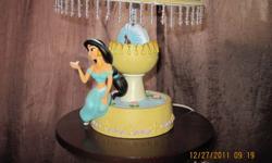 Princess Jasmine table lamp. It is like brand new. My daughter has outgrown the princess theme. It needs a light bulb as I put the bulb in her new lamp.